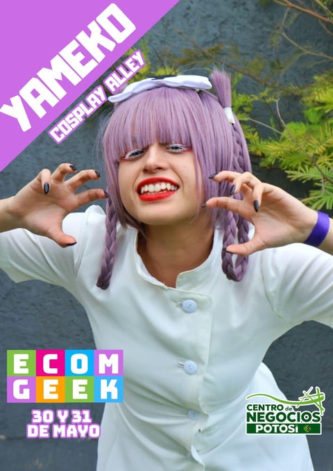 Person with lavender hair and red lipstick wearing white shirt, posing playfully with hands near head against colorful backdrop with event text