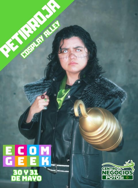 Cosplayer dressed as Petronia character wearing black jacket with fur collar, glasses, and holding a golden object at comic convention